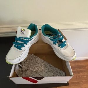 Fila Mindblower. A leather synthetic sneaker & colors white, purple, aqua & lime